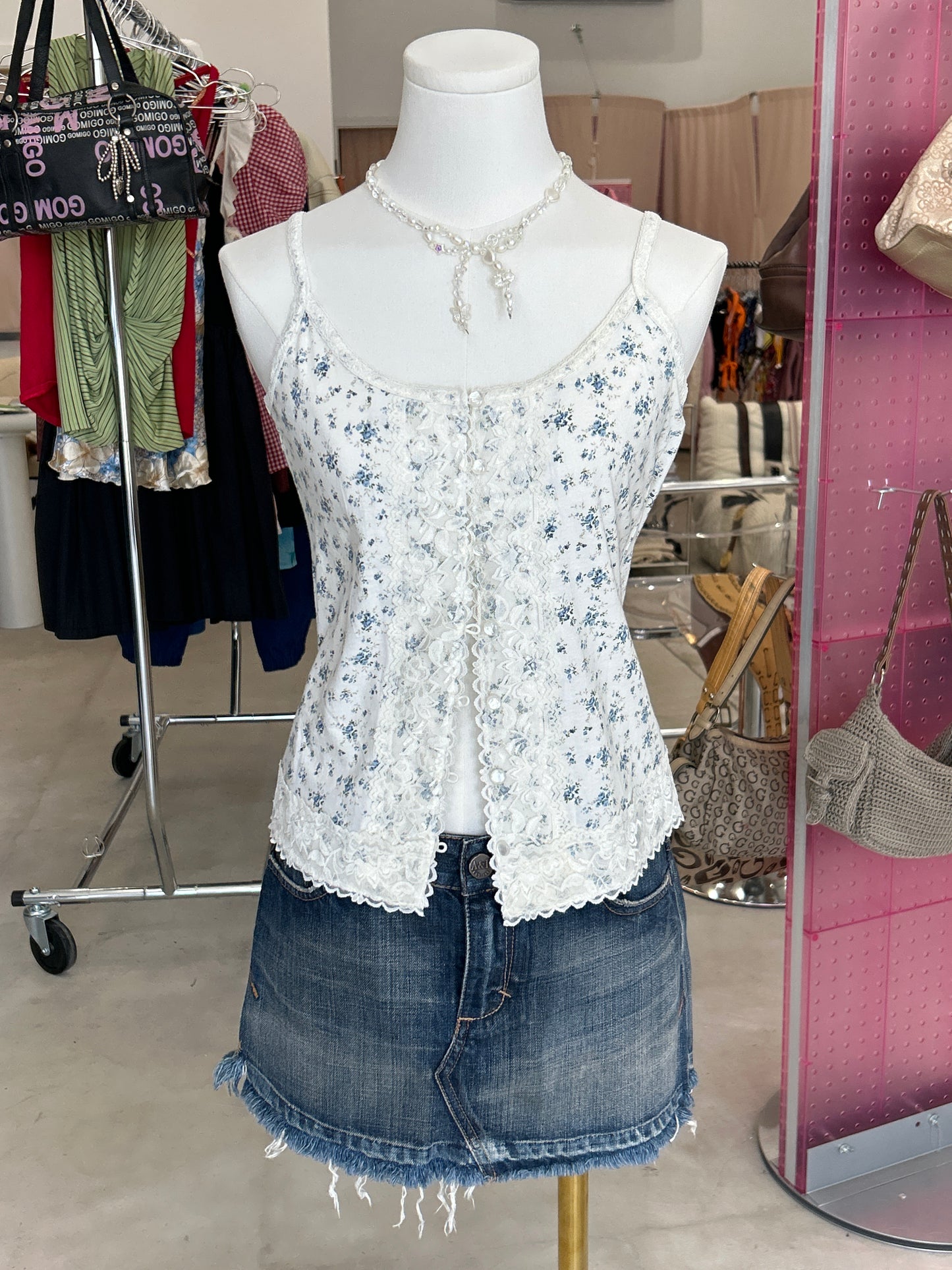 White & blue ditsy print button up tank