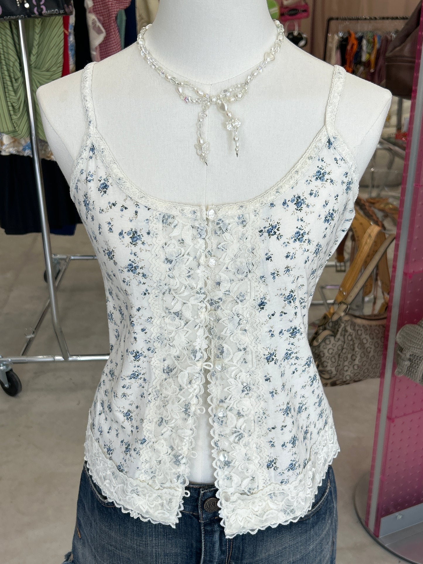 White & blue ditsy print button up tank